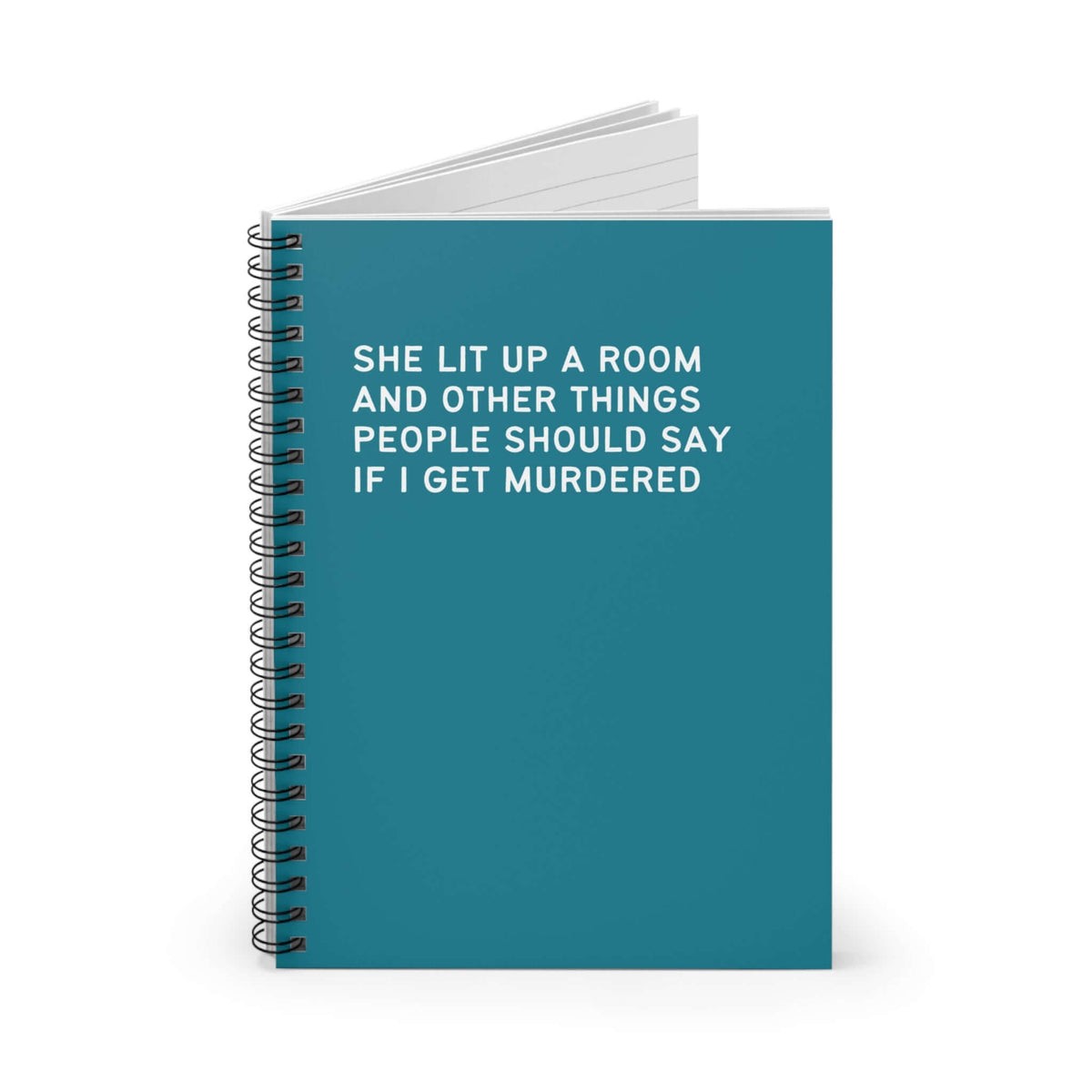 Spiral notebook with the title 'She Lit Up a Room and Other Things People Should Say if I Get Murdered' on the cover.