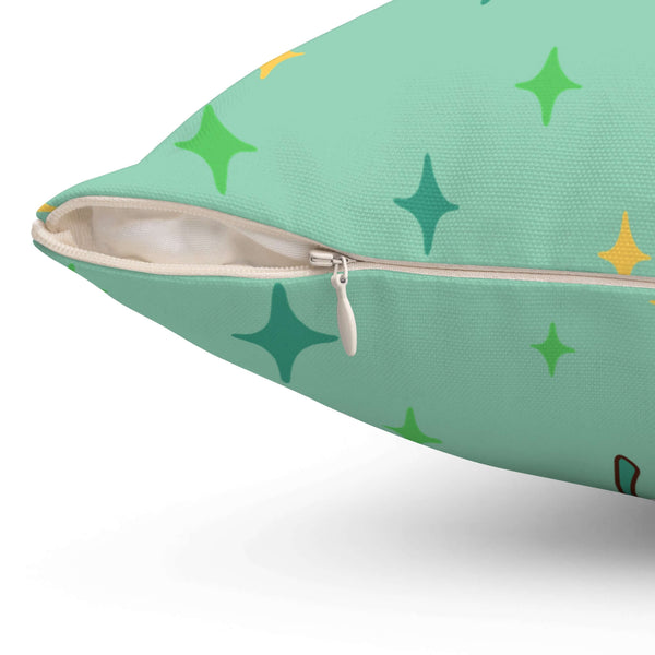 Close-up of a zipper on the Puff Puff Pass Pillow, showing the vibrant green fabric and star patterns.