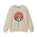 Beige sweatshirt featuring a colorful design with mountains, motocross, Bigfoot, and the text 