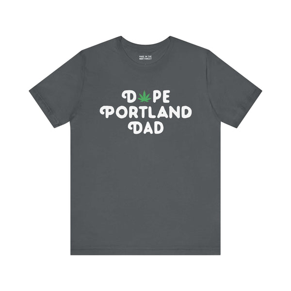 "Dope Portland Dad tee with marijuana leaf design, dark gray, showcasing laid-back Oregon spirit and PDX pride."