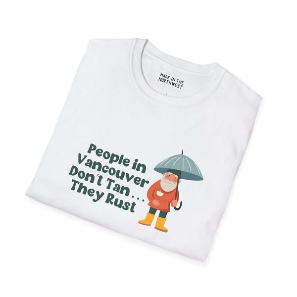 White softstyle t-shirt featuring a gnome with an umbrella and text: People in Vancouver Don't Tan, They Rust.
