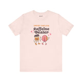 Support Your Local Caffeine Dealer coffee tee featuring playful coffee cup and donut graphic.