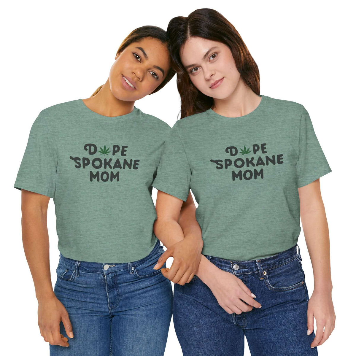Two women wearing 'Dope Spokane Mom' soft tees featuring a playful marijuana leaf in Spokane, Washington.
