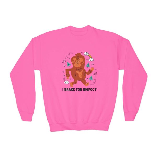 Pink kids sweatshirt featuring a playful Bigfoot design with the text 'I Brake for Bigfoot'.