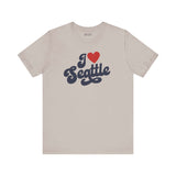 I love Seattle t shirt with a cursive design on a light background, showcasing hometown pride for Seattle.
