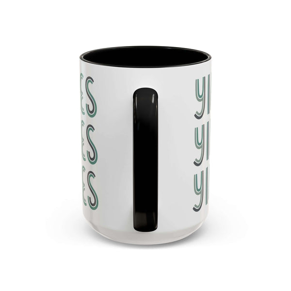 Retro Yikes Coffee Mug featuring a playful design and bold black handle, perfect for adding flair to your coffee routine.
