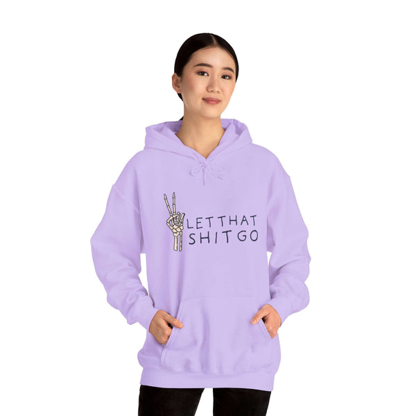 Woman wearing a purple hoodie with a skeleton hand and 'Let That Shit Go' slogan, promoting chill vibes.