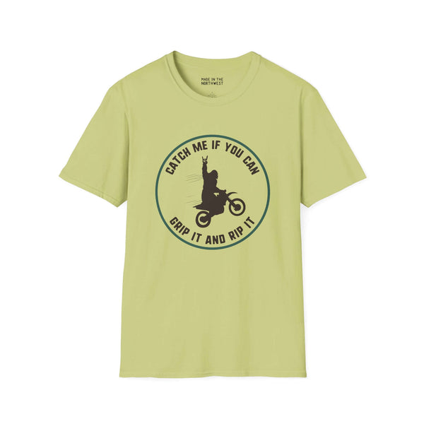 Sasquatch motocross t-shirt featuring 'Catch Me If You Can' design in light green color.