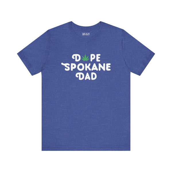 Blue "Dope Spokane Dad" tee with marijuana leaf design, celebrating local style and cool dads in Washington.