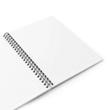 Open spiral notebook with blank lined pages, perfect for jotting down thoughts and arguments.