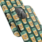 Close-up of East Meets Roast phone case with Asian-inspired coffee cup design on green background.
