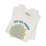 Do No Harm, Take No Sh!t premium soft tee featuring a peace flower design in pastel colors.