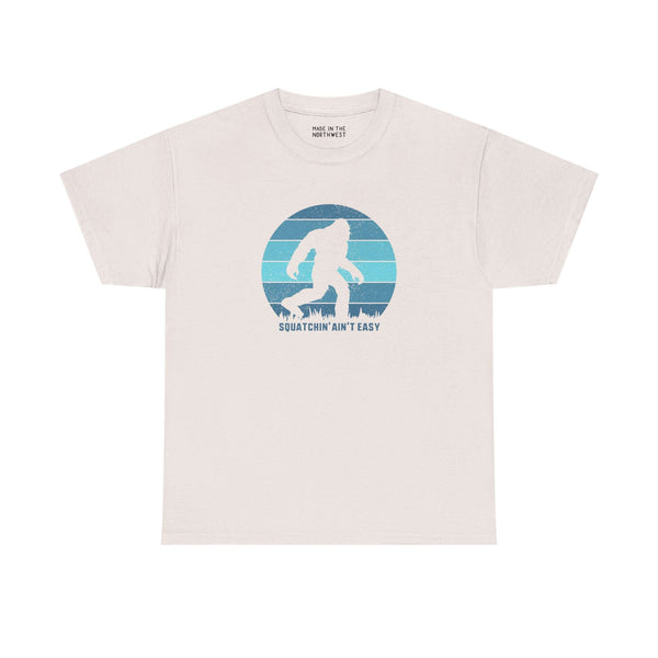 Squatchin' Ain't Easy tee shirt featuring Bigfoot graphic and unisex fit, perfect for cryptid enthusiasts.