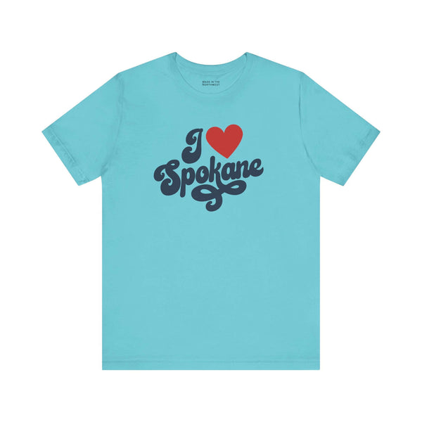 I love Spokane t shirt in turquoise with cursive design showcasing hometown pride.