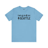 Light blue Two Oh Six Roots Tee featuring Seattle area code and tree design.