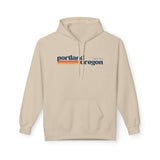 Retro Portland hoodie featuring a minimalist Portland, Oregon graphic and warm retro stripes on soft fabric.