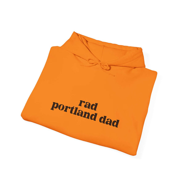 Rad Portland Dad hoodie in vibrant orange with bold black lettering, perfect for stylish local dads.