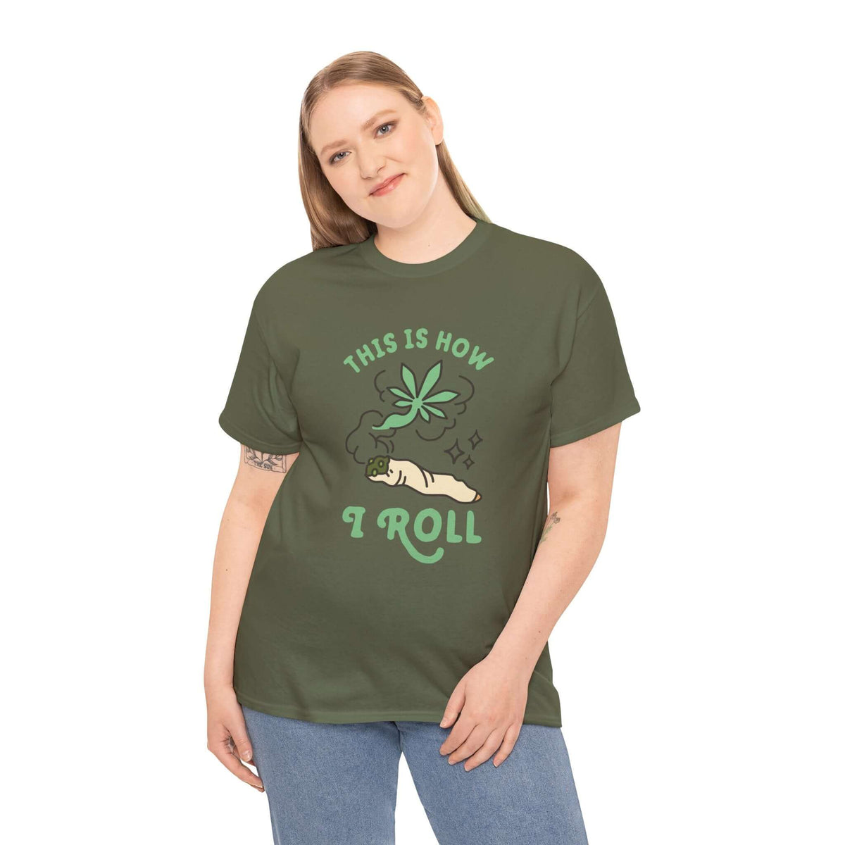 Woman wearing 'This is How I Roll' tee with marijuana joint graphic, showcasing laid-back style and good vibes.