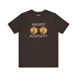 Black premium soft tee featuring 'Radiate Positivity' design with vibrant floral glasses for a feel-good vibe.