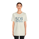 Woman wearing a 509 Floral Area Code Premium Soft Tee in light color, showcasing PNW pride and style.