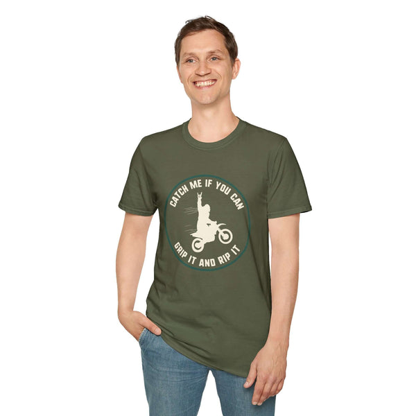 Man wearing 'Catch Me If You Can' Bigfoot motocross softstyle t-shirt in olive green.
