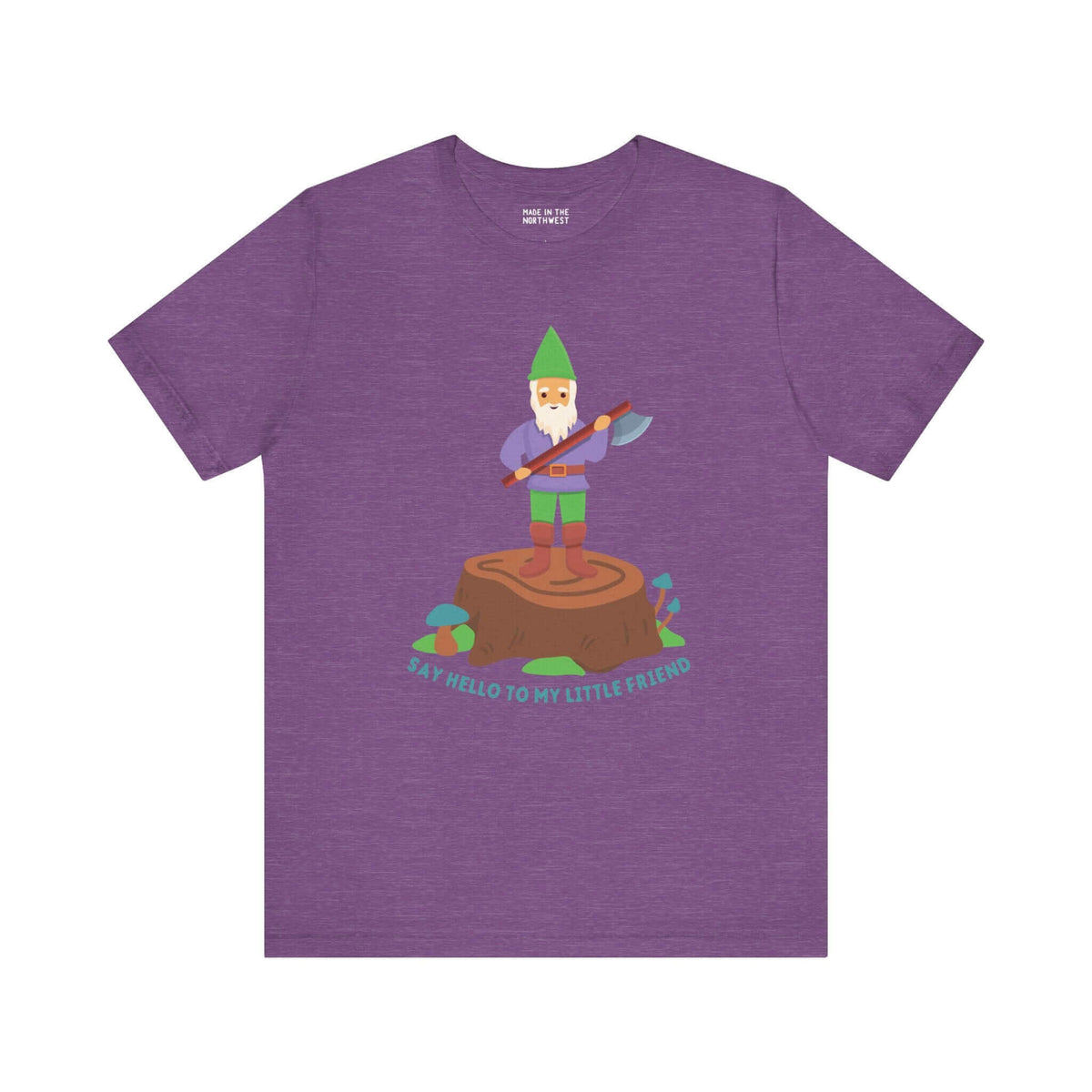 Purple tee featuring a gnome on a stump with an axe, captioned 'Say hello to my little friend', blending humor with bold style.