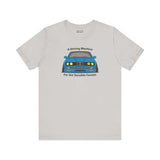 T-shirt featuring the BMW E30 325is design, titled 'A Driving Machine for the Sensible Fanatic', in soft fabric.