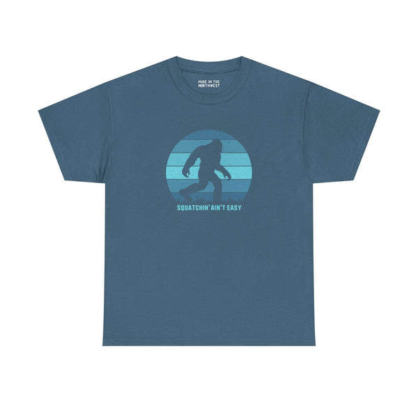 Squatchin' Ain't Easy athletic tee featuring a Bigfoot silhouette in circular design, perfect for cryptid enthusiasts.
