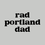 Black text design of 'Rad Portland Dad' on a gray background, perfect for local dads who embrace Portland culture.