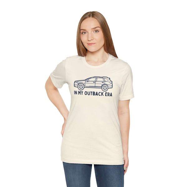 Model wearing In My Outback Era Car Lover Premium Soft Tee featuring a Subaru Outback design, perfect for PNW enthusiasts.