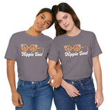 Two women wearing Hippie Soul Retro Peace soft tees, showcasing 70s-style flower glasses and peace symbols.