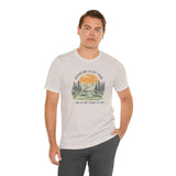 Man wearing Adventure Is Out There And So Are Serial Killers tee in outdoor setting, perfect for true crime fans.