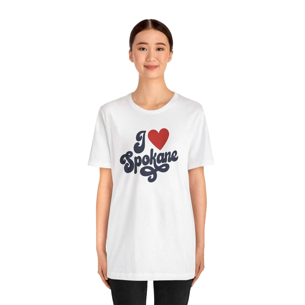 Model wearing I Love Spokane T Shirt featuring a cursive design, showcasing hometown pride in Washington.