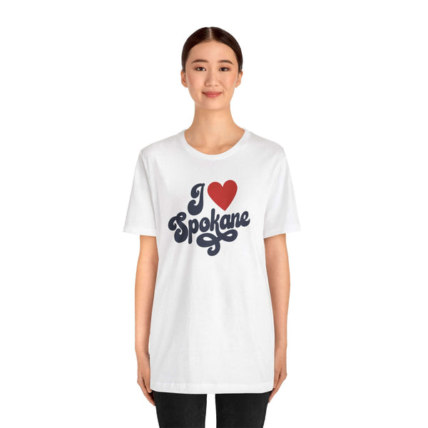 Model wearing I Love Spokane T Shirt featuring a cursive design, showcasing hometown pride in Washington.