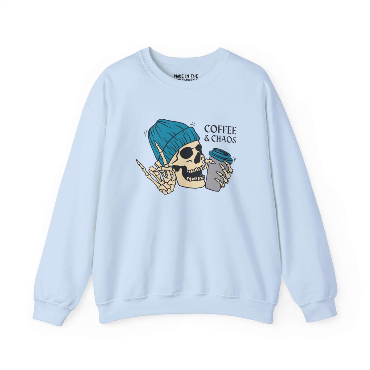 Light blue sweatshirt with a skeleton wearing a beanie, holding a coffee cup, and text "Coffee & Chaos" for caffeine lovers.