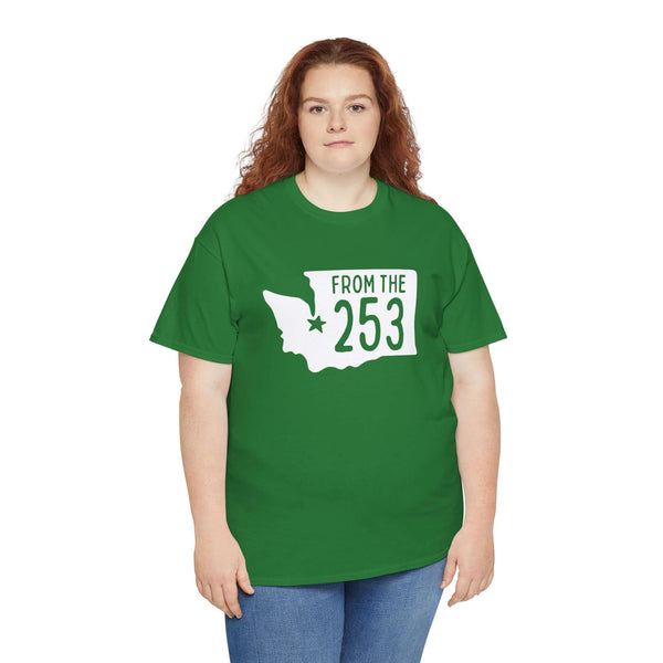 Woman wearing a green "From the 253" tee with Washington state silhouette and Tacoma star.