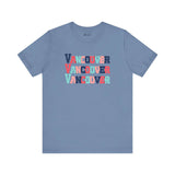 Vancouver trio design tee in blue with bold, colorful block letters, perfect for adding vibrant style and city pride to your wardrobe.