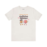 Funny coffee-themed soft tee featuring cartoon characters with text: Support Your Local Caffeine Dealer.