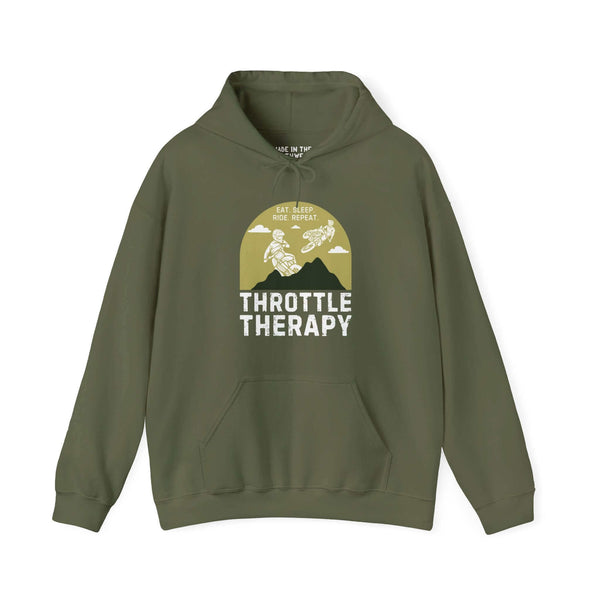 Olive green Throttle Therapy hoodie featuring motocross design with dirt bikers and mountain backdrop for adventure enthusiasts.