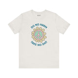 Do No Harm, Take No Sh!t premium soft tee featuring a peace flower design, promoting kindness and strength.