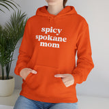 Spicy Spokane Mom cozy hoodie in vibrant orange, perfect for stylish Spokane moms who love adventure.