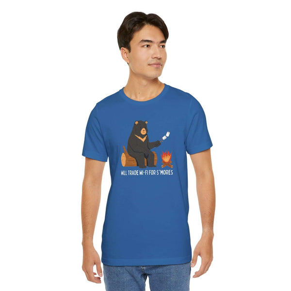 Model wearing the Will Trade Wi-Fi for S'mores soft tee with bear roasting marshmallows by a campfire.