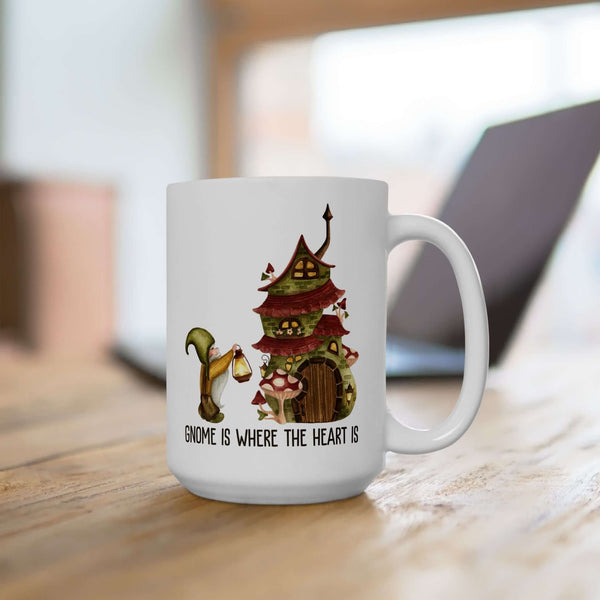 Gnome Is Where The Heart Is ceramic mug with gnome and cozy mushroom house design, perfect for whimsical coffee moments.