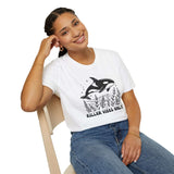 Woman smiling in a Killer Vibes Only Orca Whale T-Shirt, featuring a bold orca graphic and a relaxed fit.