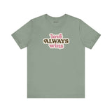 love always wins t shirt in olive green with bold typography celebrating love and pride.