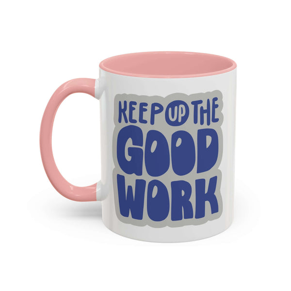 Keep Up The Good Work Mug with bold text design on a glossy white exterior and pink handle.