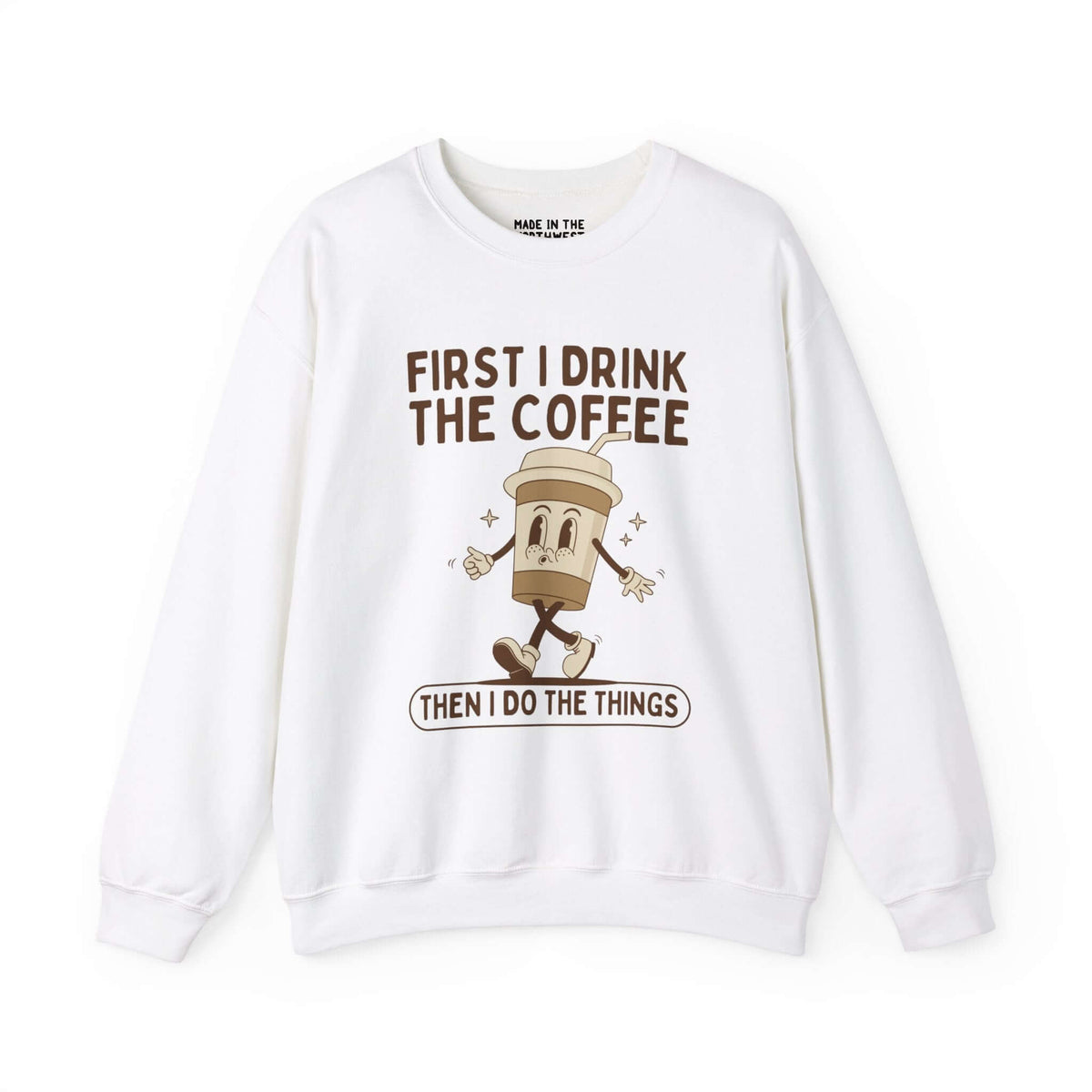 White sweatshirt with "First I Drink the Coffee Then I Do the Things" design featuring a cartoon coffee cup character.