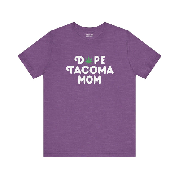 Purple "Dope Tacoma Mom" tee with marijuana leaf design, celebrating cool Washington moms.