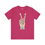 Power in Peace Premium Soft Tee featuring a hand making a peace sign with uplifting words on a pink shirt.