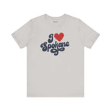 I love Spokane t shirt featuring a cursive design on a light gray background.